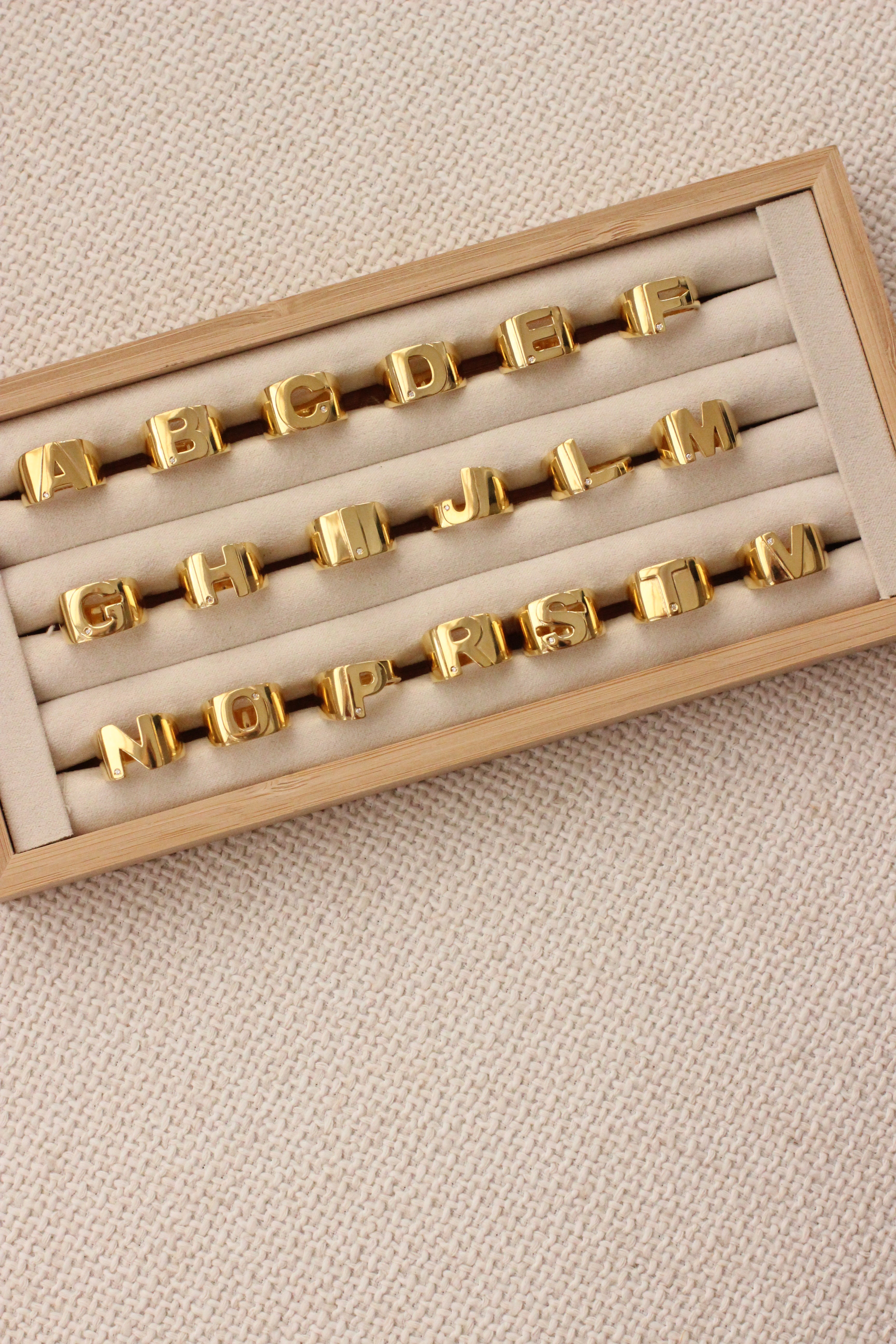 GOLD AND DIAMOND INITIAL SILHOUETTE RING